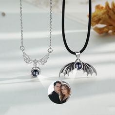 ### Custom Photo Projection Necklace for 2 **Description The Custom Photo Projection Necklace for 2 is a unique and personalized piece of jewelry that allows you to carry cherished memories with you wherever you go. This necklace features a pendant that can project custom images, creating a meaningful and visually stunning accessory. The pendant is designed for two photos, making it an ideal token for couples, friends, or family members. **Benefits 1. **Personalized Keepsake This necklace provides a customizable way to cherish memories by incorporating two special photos.    2. **Emotional Connection Wearing the necklace allows individuals to maintain a deep emotional connection with the images and the people represented in them. 3. **Unique Projection Feature The projection technology add Black Couple's Necklace As Gift, Personalized Black Couples Jewelry, Black Stainless Steel Jewelry For Anniversary, Personalized Black Necklace For Anniversary, Black Engraved Jewelry For Anniversary Gift, Black Engraved Jewelry For Anniversary, Customizable Silver Couples Jewelry, Customizable Black Jewelry For Valentine's Day, Black Sterling Silver Jewelry For Anniversary Gift