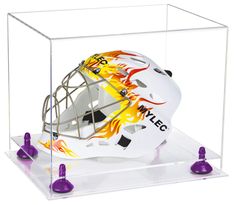 a hockey goalie's helmet in a clear case with red stoplights on the sides