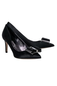 Step out in style with these Ferragamo pumps! In a sleek black satin material with a pointed toe and bow front, they'll pair perfectly with a fancy party dress. Your feet will be ready for any social season event! Size 8 Made in Italy Satin upper Leather lining and sole Black and gunmetal bow toe detail Pointed toe Minor blemishes on heel Heel height 3" High Heel Court Shoes With Bow For Party, Satin Closed Toe Heels With Bow, Party Heels With Bow And Almond Toe, Satin Heels With Satin Bow And Round Toe, Pointed Toe Court Shoes With Bow For Party, Round Toe Heels With Satin Bow For Evening, Fitted Heels With Bow And Pointed Toe, Fitted Heels With Satin Bow And Round Toe, Evening Heels With Satin Bow And Round Toe