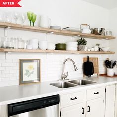 a white kitchen with open shelving above the sink and stainless steel dishwasher