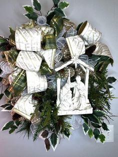 christmas wreath with nativity scene and evergreen leaves