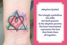 a tattoo on the wrist with an image of a heart and words above it that read, adoption symbol