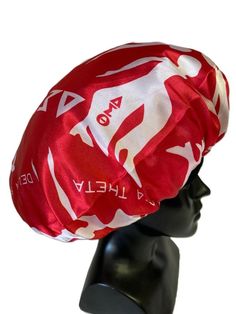 a red and white bandana on top of a mannequin's head