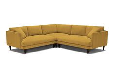 a yellow sectional couch with wooden legs on an isolated white background