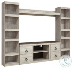 a large entertainment center with drawers and shelves