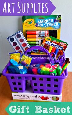 a purple basket filled with art supplies on top of a wooden table