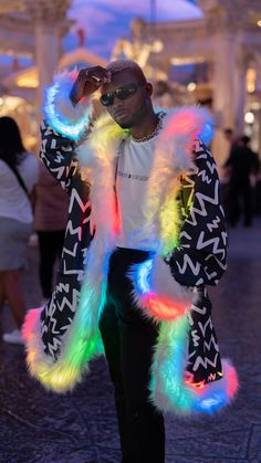 This is our newest innovation and expansion from fiber optic fashion to LED high end quality products. I have worked on this coat for about 2 years and you will find all visible and hidden values that this amazing faux fur LED 360 has to offer.  This gem of LED fashion is reversible. You are basically getting 2 styles in 1 piece.  My breathtaking coat is packed with 360 highest brightness LEDs lighting coat all around 360 degrees. Burning Man Camps, Man Camping, Holographic Fashion, Man Coat, Outfit Rave, Books Ideas, Man Outfit, Outfit Festival, Festival Outfits Rave