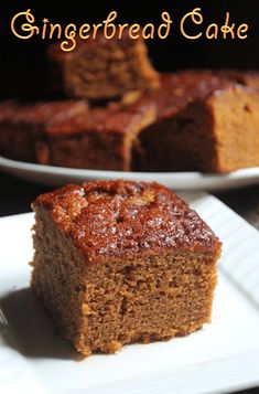 a close up of a piece of cake on a plate with another slice in the background