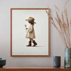 Add a dash of western charm to your cowgirl nursery with this sweet and timeless cowgirl print. This printable wall art showcases a little girl in classic cowboy boots and a hat, holding a daffodil, making it the perfect piece for a baby girl nursery. Ideal for a country nursery, this cowgirl wall art brings the magic of the West right to your child's room. This girls nursery print is perfect for creating a welcoming and warm space with cowgirl decor. Whether you're going for a rustic nursery de Country Nursery, Rodeo Baby, Western Nursery, Cowgirl Room, Rustic Nursery Decor, Cowgirl Decor, Cowgirl Nursery, Baby Printables, Rustic Nursery