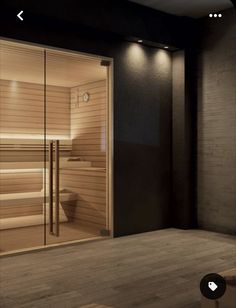 an empty sauna in the middle of a room