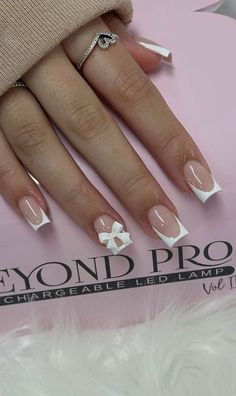 There's a new beauty trend taking over Instagram and it's absolutely stunning. Say hello to "quartz nails". Short Square Acrylic Nails French Tips With Bow, French Tip Nails With Bow Charm, Acrylic Nails With Bow Charms, French Tips Coquette, White Tip Acrylic Nails, Classic Nail Designs, Couqutte Nails Bow, May Nails, Spring Acrylic Nails