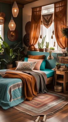 a bedroom with green walls and wooden flooring is decorated in shades of teal