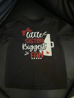 Cheer sister tshirt Cheer Sister Shirt, Cheer Sister Shirts, Football And Cheer Sister Shirts, Cheer Big Sister Shirts, Black T-shirt For Cheerleading Fan Apparel, Cheerleading Fan Apparel T-shirt With Short Sleeves, Sister Tshirts, Pompano Beach, Kids Tops