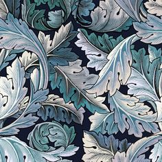 a blue and white wallpaper with leaves on it