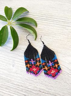 Ethnic Floral Beaded Fringe Earrings Seed Bead Earrings Dangle | Etsy Turkey Traditional Fringe Beaded Drop Earrings, Bohemian Black Dangle Flower Earrings, Black Bohemian Dangle Flower Earrings, Bohemian Chandelier Earrings With Fringe And Round Beads, Bohemian Chandelier Earrings With Beaded Fringe, Beaded Fringe Chandelier Earrings For Festivals, Festival Beaded Fringe Chandelier Earrings, Bohemian Handwoven Dangle Beaded Earrings, Bohemian Beaded Earrings With Fringe