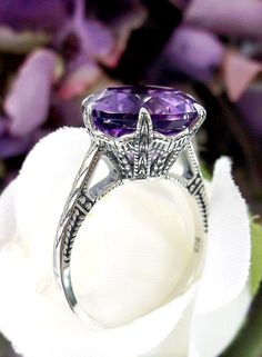 Natural Purple Amethyst Ring  100 Year Design#37 Introducing our stunning Natural Amethyst Ring, expertly crafted with 5ct round cut natural amethyst set in a solid sterling silver Edwardian filigree setting. This exquisite ring features a gorgeous 12mm Natural Purple Amethyst gemstone, with a beautiful crown-like design on the filigree setting and etched band.  Each ring is marked with a 925 stamp, ensuring its authenticity and high quality. This is a faithful reproduction of an original ring f Pink Topaz Ring, Mystic Fire Topaz, Amethyst Set, Purple Amethyst Ring, Ring Ideas, Purple Band, Sterling Silver Filigree, Filigree Ring, Topaz Ring