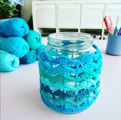 there is a jar that has yarn in it