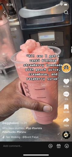 someone is holding up a pink drink with whipped cream on it and the caption reads,