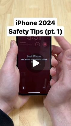 someone holding their cell phone with the text iphone safety tips pt 1 on it, in front of a wooden table