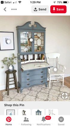 an old blue hutch has been converted into a desk and chair for sale on instagram