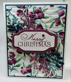 a close up of a christmas card with flowers