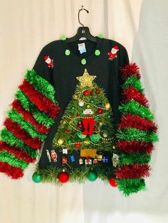 an ugly ugly christmas sweater hanging on a wall