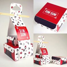 an open box with chopsticks sticking out of it and the inside is decorated in red, white and black