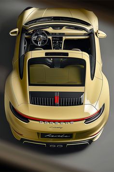 an overhead view of a gold sports car