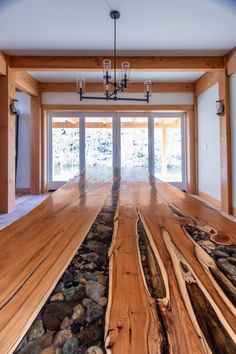 Wooden slab table with river rock enveloped River Rock Countertop, Cabin By The River, Cute Cabins, Epoxy Countertop, Table Rock, Slab Table, A Cabin, River Rock, Remodels