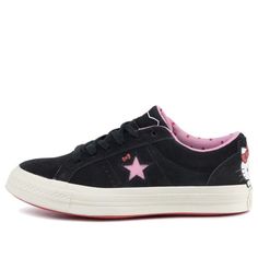 Hello Kitty fans rejoice! The iconic character has teamed up with sneaker giant Converse on the One Star Suede Low Top. The shoe is crafted from premium suede and features a pink star logo with Hello Kitty's bow just above it. Hello Kitty herself makes an appearance on the heel, adding a fun and playful touch. The sneaker comes equipped with Hello Kitty branded laces and a polka dot motif on the sockliner, making it the perfect choice for any Hello Kitty fan. Converse 1 Star, Sanrio Products, Black Skate Shoes, Pretty Sneakers, Hello Kitty Bow, Hello Kitty Shoes, Outfit References, Rockstar Gf, Shoe Ideas