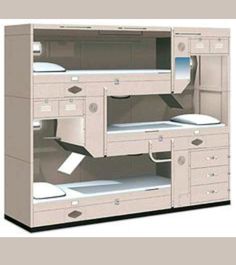 the bunk bed is built into the side of the wall and has drawers on both sides