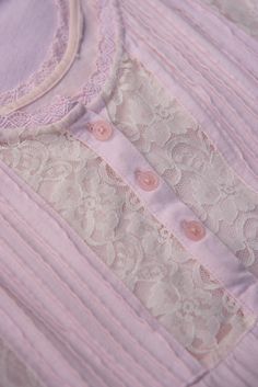 "Sweetest vintage 80's - 90's nightgown! Pale pink soft cotton with white lace and buttons at the chest. Condition: In great vintage condition. Light average wear - no issues to note! Measurements: Seems to best fit a size small - medium Bust: 36\" Waist: 48\" Hips: 48\" Overall Length: 45\" For reference, model is 5'9\"and measures 33/29/39 All measurements are taken flat and then doubled when appropriate. Please let us know if you have any questions about sizing or fit. Please check out the sh Pink Delicate Lace Sleepwear, Feminine Pink Sleepwear With Delicate Lace, Pink Lace Sleepwear For Bedtime, Pink Feminine Sleepwear With Lace Trim, Feminine Pink Sleepwear With Lace Trim, Feminine Lace Trim Nightgown For Pajama Party, Pink Cotton Nightgown For Bedtime, Pink Delicate Lace Sleepwear For Spring, Pink Lace Trim Sleepwear For Loungewear