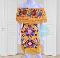 "Lace Trim Off the shoulder tie back Mexican dress with butterfly and sunflower embroidery. Made out of manta, 100% cotton. Color:Blue Small/Medium Bust- 42\" Hips- 44\" Waist- 44\" Length- 34\" Large Bust- 48\" Hips- 48\" Waist- 48\" Length- 38\" X-Large Bust- 52\" Hips- 52\" Waist- 52\" Length- 38\" 🧵Made in Chiapas, Mexico. 🧺Care Instructions: We recommend hand washing, lay flat to dry. 📲Please feel free to message me with any questions regarding sizing and fit. 📷Additional photos can be Bohemian Embroidered Off-shoulder Summer Dress, Bohemian Off-shoulder Embroidered Summer Dress, Yellow Bohemian Dress With Floral Embroidery, Bohemian Off-shoulder Embroidered Dress, Fitted Yellow Bohemian Embroidered Dress, Yellow Folk Dress For Spring, Traditional Yellow Embroidered Summer Dress, Yellow Embroidered Summer Dress, Traditional Yellow Embroidered Dress For Summer