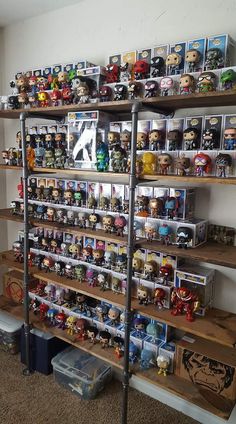 the shelves are filled with many different types of action figures