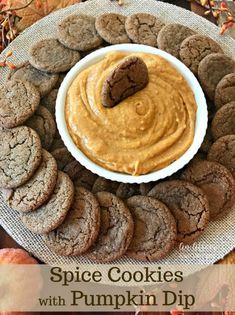 a plate filled with cookies and peanut butter dip