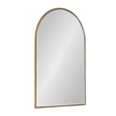 a gold framed mirror with beaded trim around the edges and an arched design, on a white background