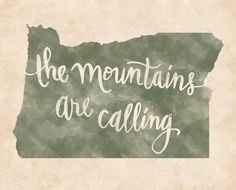 the mountains are calling written in white ink on a green and beige background with an old map