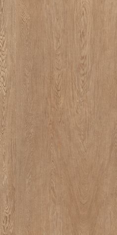 a close up view of the wood grains on this flooring material, which is light brown in color