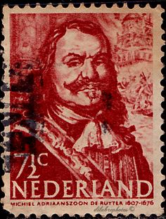 a stamp with an image of nederland in red and black on the front