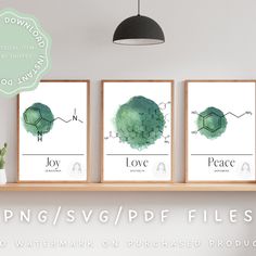 three green watercolor posters with the words love, joy and peace on them in front of a shelf