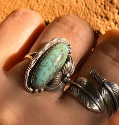 🌵🐴This is a lovely Old Pawn Navajo Sterling Silver Turquoise Signed Ring,  size 8.75. Looks even better in person. It features a great minty green cab and stamping all the way around. I especially love this chunky oval cab and the sterling applique leaf flanking one side. A lot of work went into the creation of this awesome ring.  🌵🐴This ring is comfortable to wear and is on the daintier side - perfect for all the cowgirls who prefer a ring for any occasion and activity! From the barn to the boardroom! 1 1/8" by 3/4"! Ca. 1960s. Vintage turquoise ring only! Old Pawn Turquoise Jewelry, Untreated Bohemian Turquoise Ring, Unique Green Turquoise Ring, Southwestern Style Green Turquoise Ring As Gift, Green Vintage Adjustable Rings, Adjustable Vintage Green Rings, Bohemian Turquoise Gemstone Ring, Bohemian Green Turquoise Gemstone Ring, Handmade Southwestern Green Rings