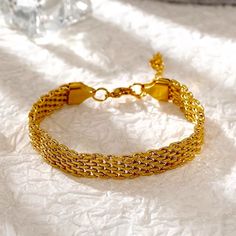 Highlights: Built To Withstand Everyday Wear, Hypoallergenic And Non-Tarnish Bracelet, Unisize, Waterproof Bracelet. This Elegant Everyday Mesh Bracelet Subtly Stands Out Drawing Beauty From Its Mere Simplicity. Crafted Out Of Rich 18k Yellow Gold On A Lightweight Non-Irritating Build To Ensure Your Everyday Bracelets Keep Up With Your Busy Everyday Lifestyle. Wear It As A Dainty Bracelet Whether You're Sporting It Out With Your Favorite Casual Tee And Jeans Or Layering It With Your Favorite Jew Gold Bracelets For Women Indian, Everyday Bracelets, Waterproof Bracelet, Golden Bracelet, Everyday Bracelet, Bracelet Dainty, Dainty Bracelet, Gold Bracelet For Women, Gold Bracelets