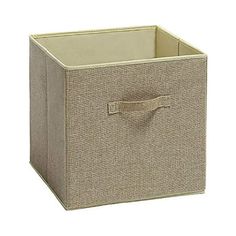 a beige fabric storage box with handles