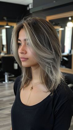 25 Silver Hair Color Ideas for Ultimate Sophistication Brown Hair With Grey Balayage, Striking Hair Color Highlights, Dark Brown Hair Silver Highlights, Ash Hair With Highlights, Dark Hair Color With Highlights, Dark Hair With Gray Highlights, Silver Highlights On Dark Hair, Blonde Hair With Brown Roots, Hair Color Ideas Trendy