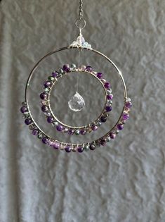 an image of a wind chime with beads