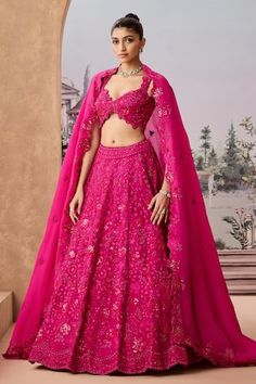 Magenta can can attached lehenga featuring tonal thread embroidered rosette vine motifs highlighted by sequins and bead embellishments. Comes with cut-out border embroidered padded blouse and dupatta. - Aza Fashions Fitted Lehenga With Lace Work In Traditional Drape, Fitted Lehenga With Lace Work For Festive Occasions, Fitted Lace Work Lehenga For Festive Occasions, Fitted Pink Sets For Ceremony, Pink Lehenga With Lace Work, Pink Lace Work Lehenga For Wedding, Fitted Choli With Dupatta For Ceremony, Fitted Wedding Lehenga With Lace Work, Wedding Lace Work Fitted Dupatta