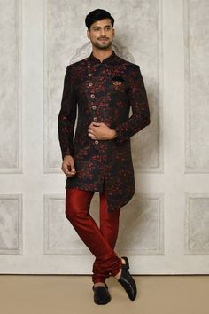 Multi color asymmetric hem sherwani with all over floral branch pattern. Paired with a dark red churidar.
Components: 2
Pattern: Woven
Type Of Work: Floral Branch
Neckline: Stand Collar
Sleeve Type: Full Sleeves
Fabric: Sherwani: Jaquard, Churidar: Dupion Art Silk
Color: Multi Color
Other Details: 
Closure: Front buttons
Embellished brooch detailing
Note: Pocket square worn by the model is not for sale
Occasion: Sangeet - Aza Fashions Elegant Fitted Traditional Wear With Floral Print, Fitted Elegant Floral Print Traditional Wear, Designer Long Sleeve Floral Print Sherwani, Designer Floral Print Long Sleeve Sherwani, Fitted Floral Print Bandhgala For Festive Occasions, Festive Floral Print Fitted Bandhgala, Festive Fitted Floral Print Bandhgala, Fitted Floral Print Traditional Wear, Fitted Floral Traditional Wear