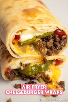 a close up of a burrito on a plate