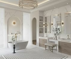 an elegant bathroom with white marble walls and flooring, along with two sinks and a bathtub