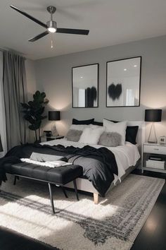 a bedroom with a large bed and two pictures on the wall